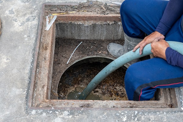 regularly scraping and cleaning the grease trap and installing a strainer on sinks can help extend the time between grease trap pumping appointments